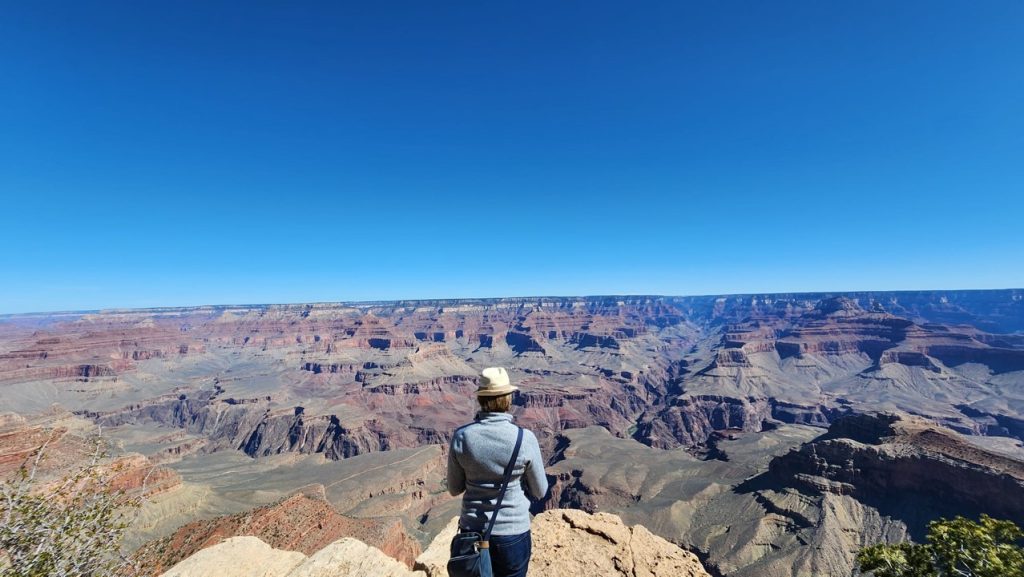 Author standing looking out at the Grand Canyon, Arizona